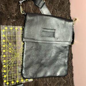 Roots computer bag with cord bag